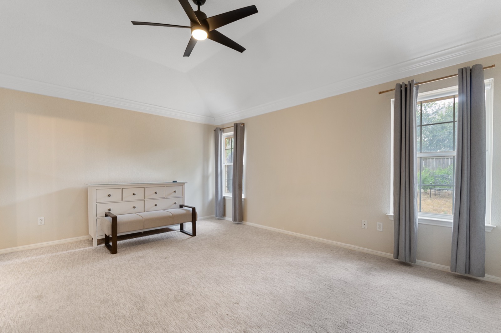 Spacious carpeted bedroom