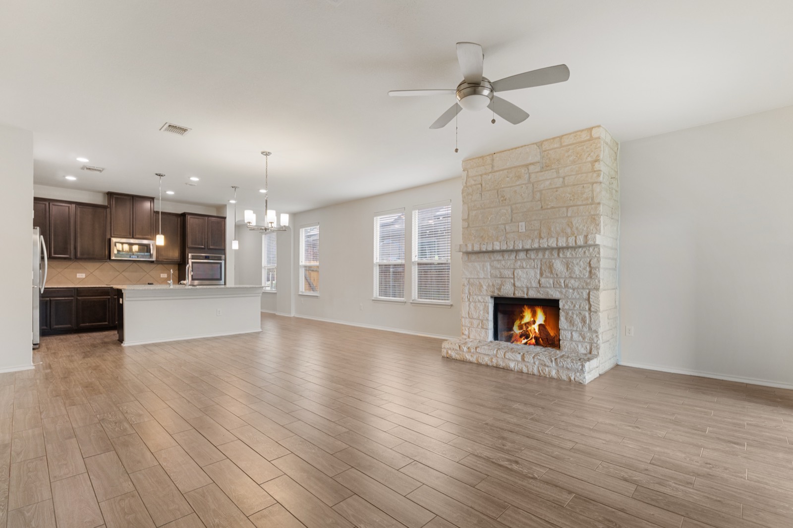 Living room with stone fireplace