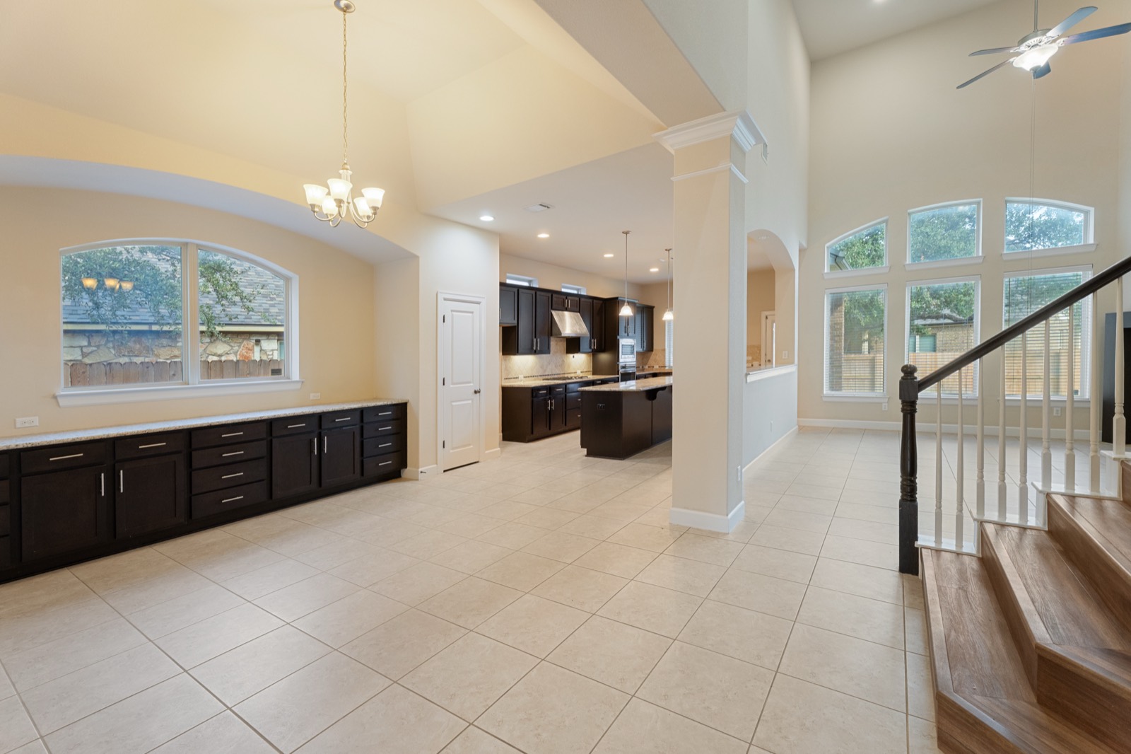 Open dining and kitchen with high ceilings