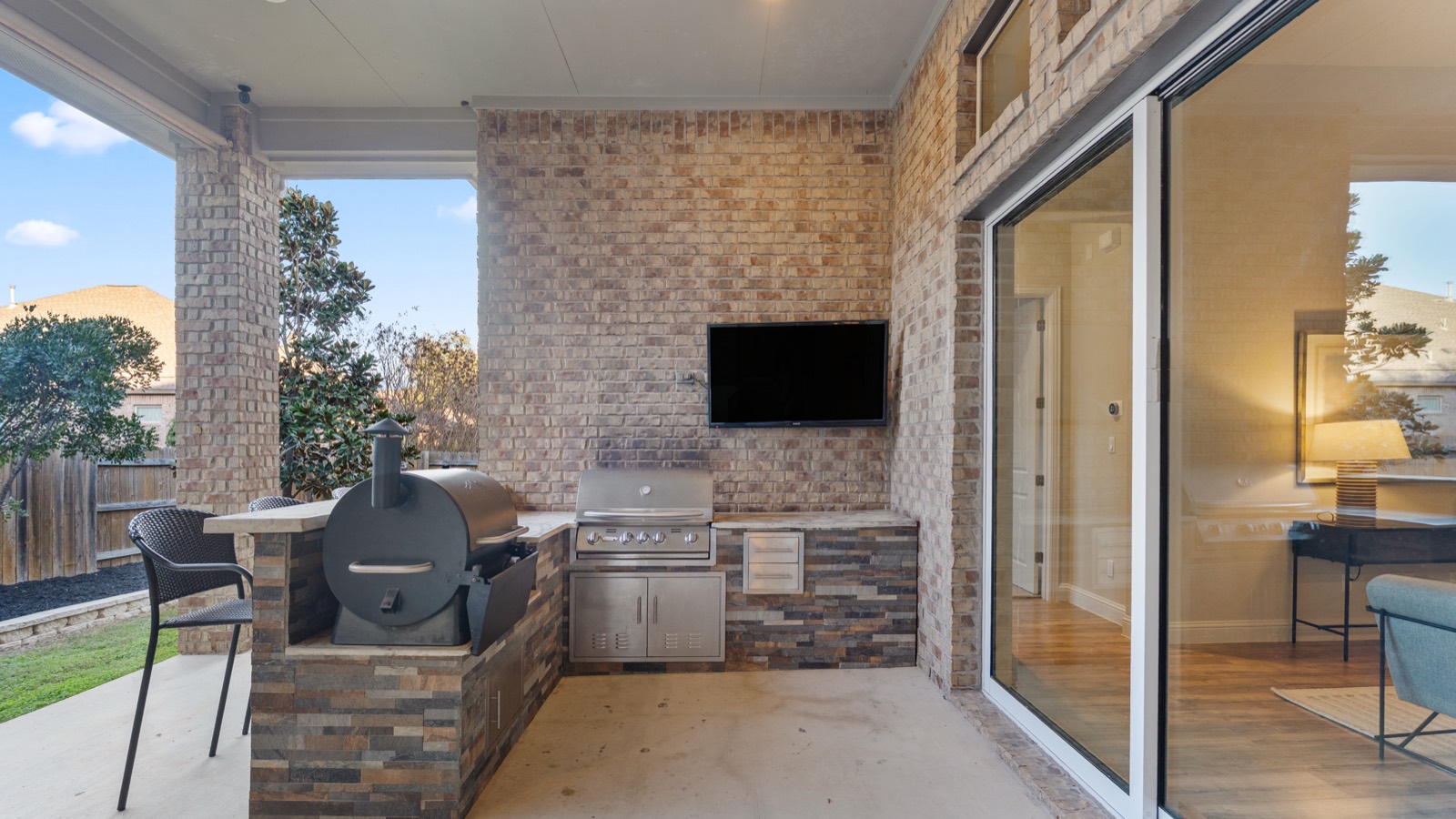 Covered patio with built-in outdoor kitchen